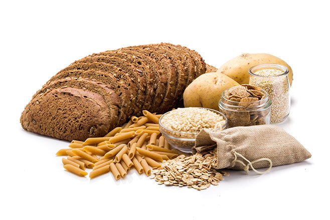 Group of whole foods, complex carbohydrates isolated on a white background