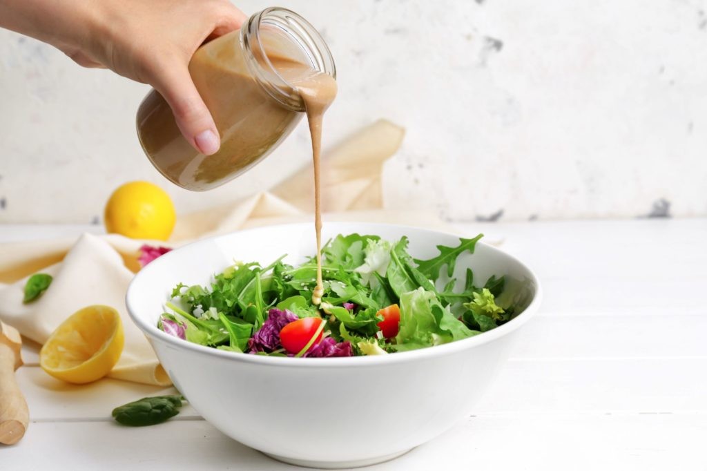 tahini dressing on a salad