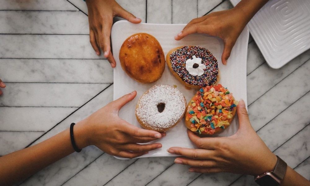 enjoying donuts